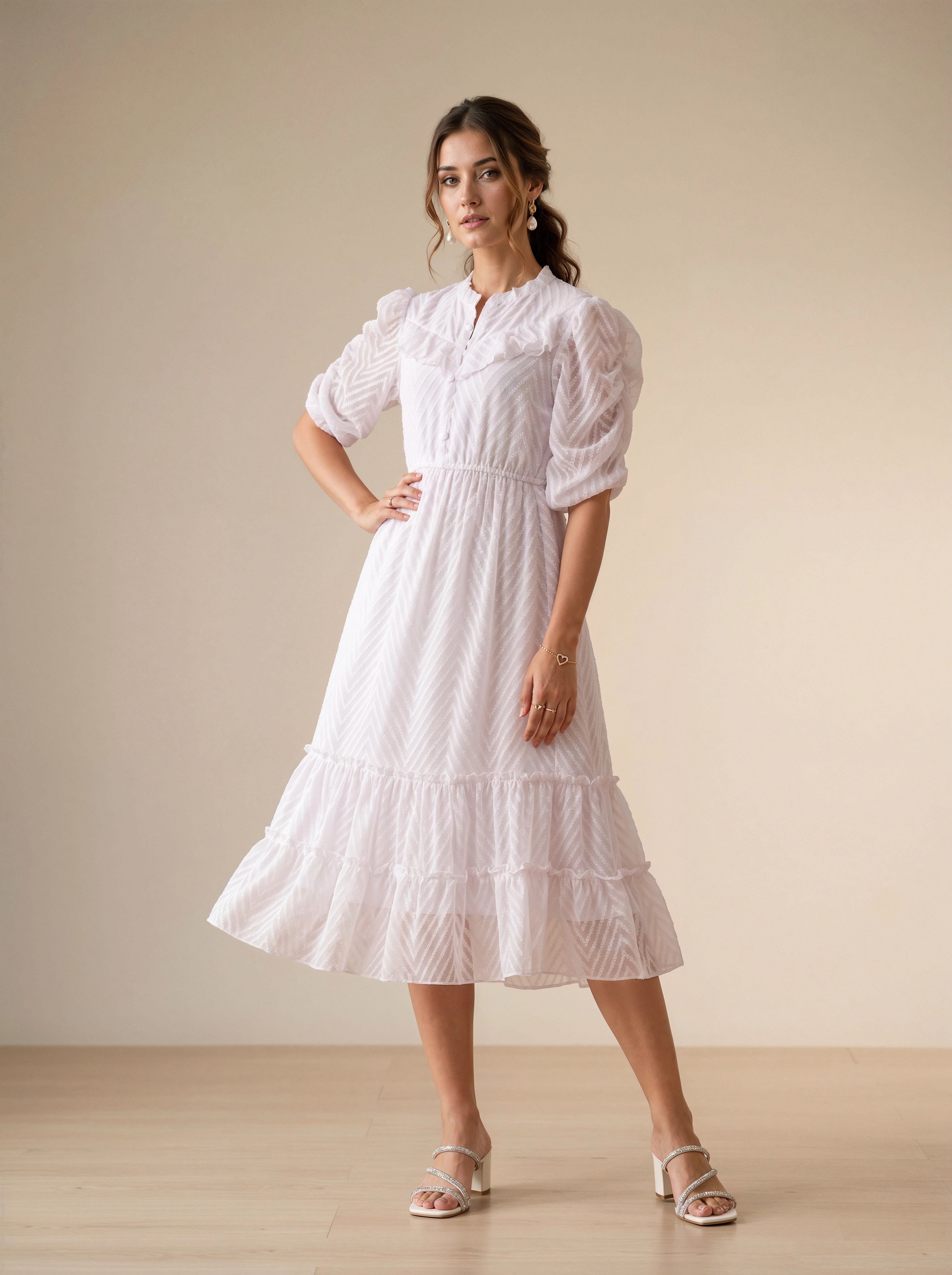 Woman wearing a white lace dress in a minimalistic setting