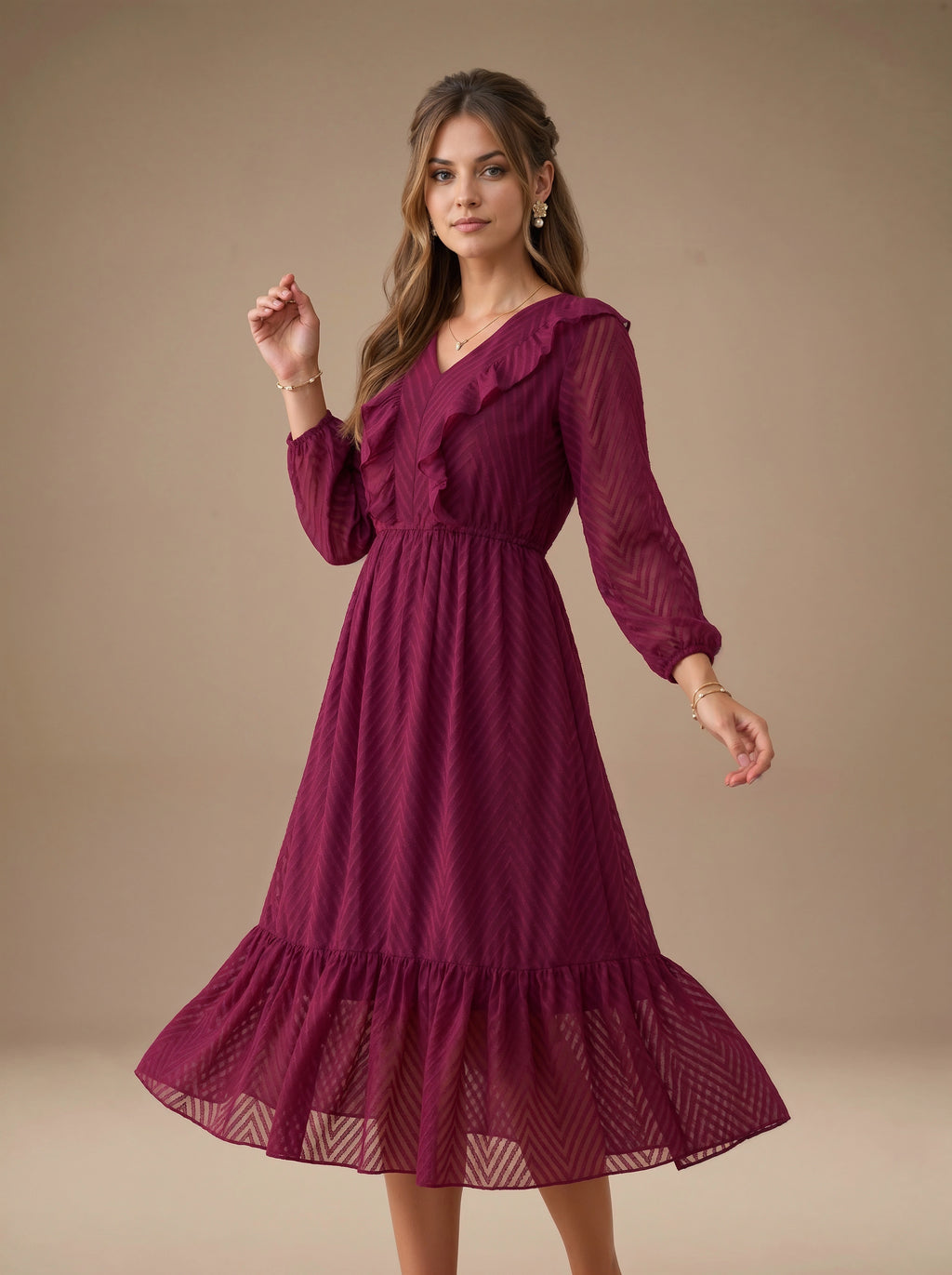Woman wearing a burgundy dress with long sleeves against a beige background