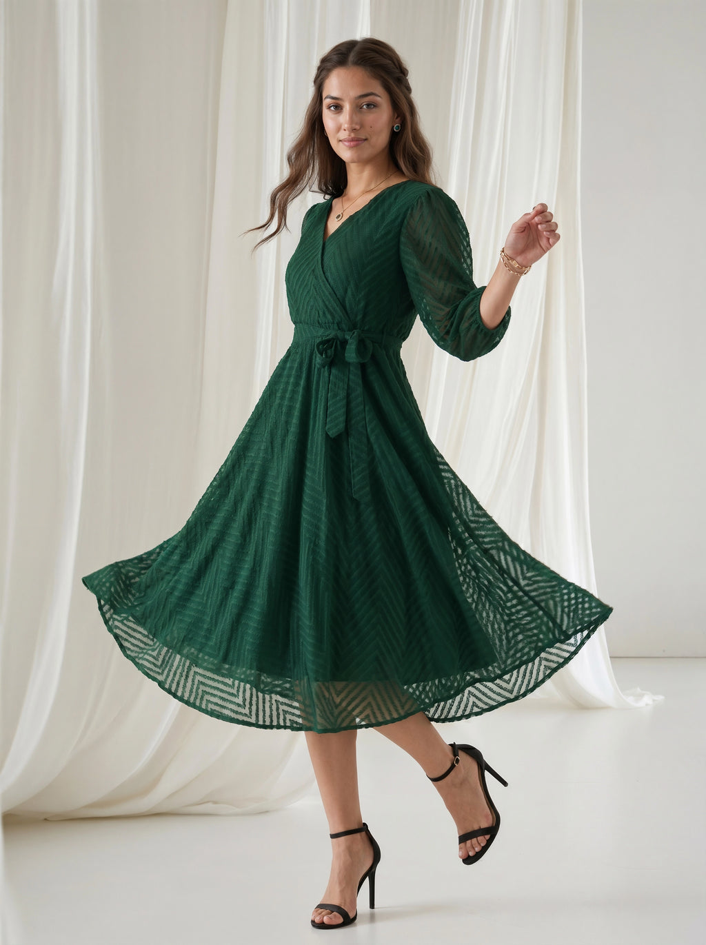Woman wearing a green dress with a white curtain background