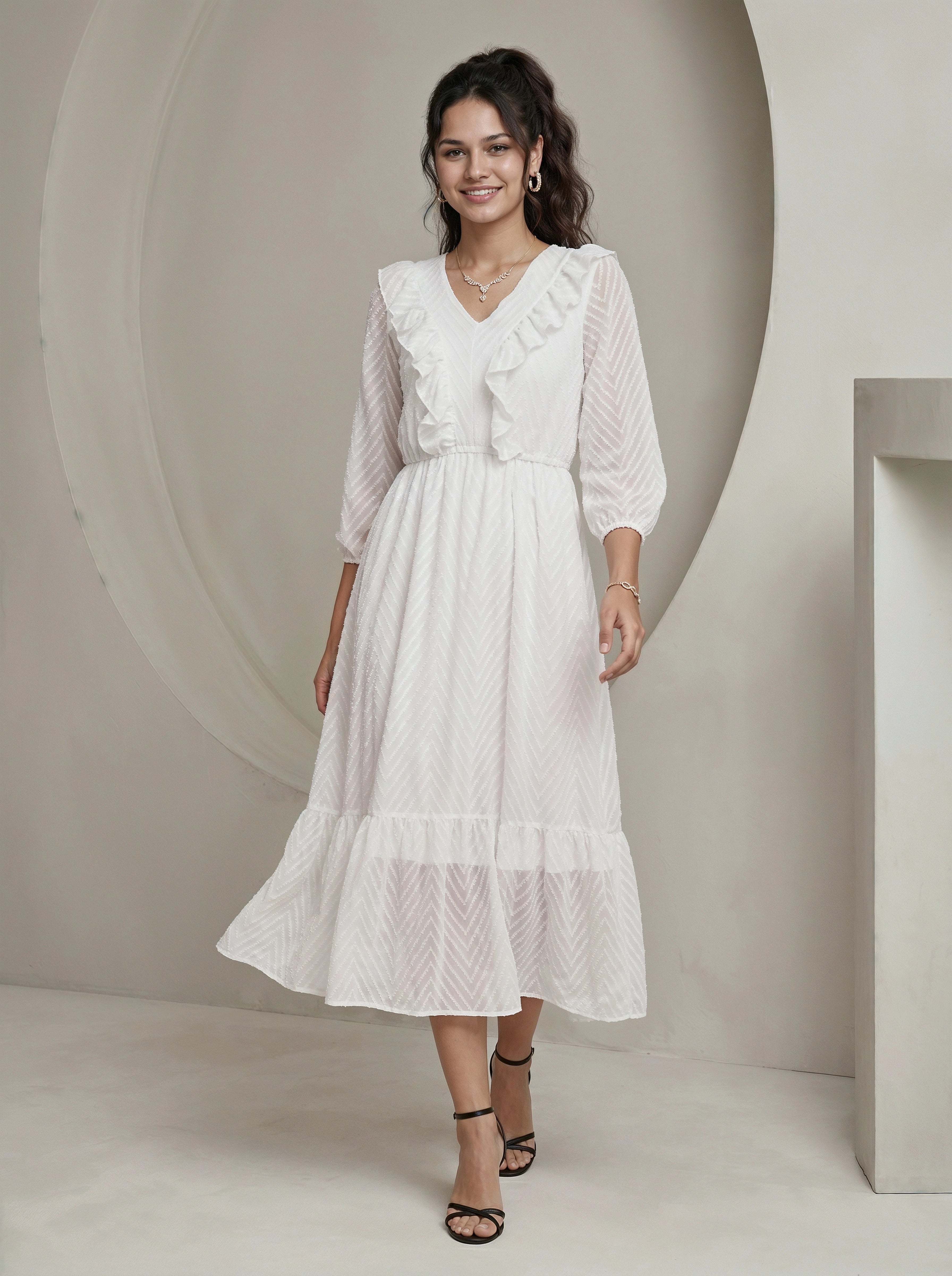 Woman wearing a white lace dress in a minimalistic setting