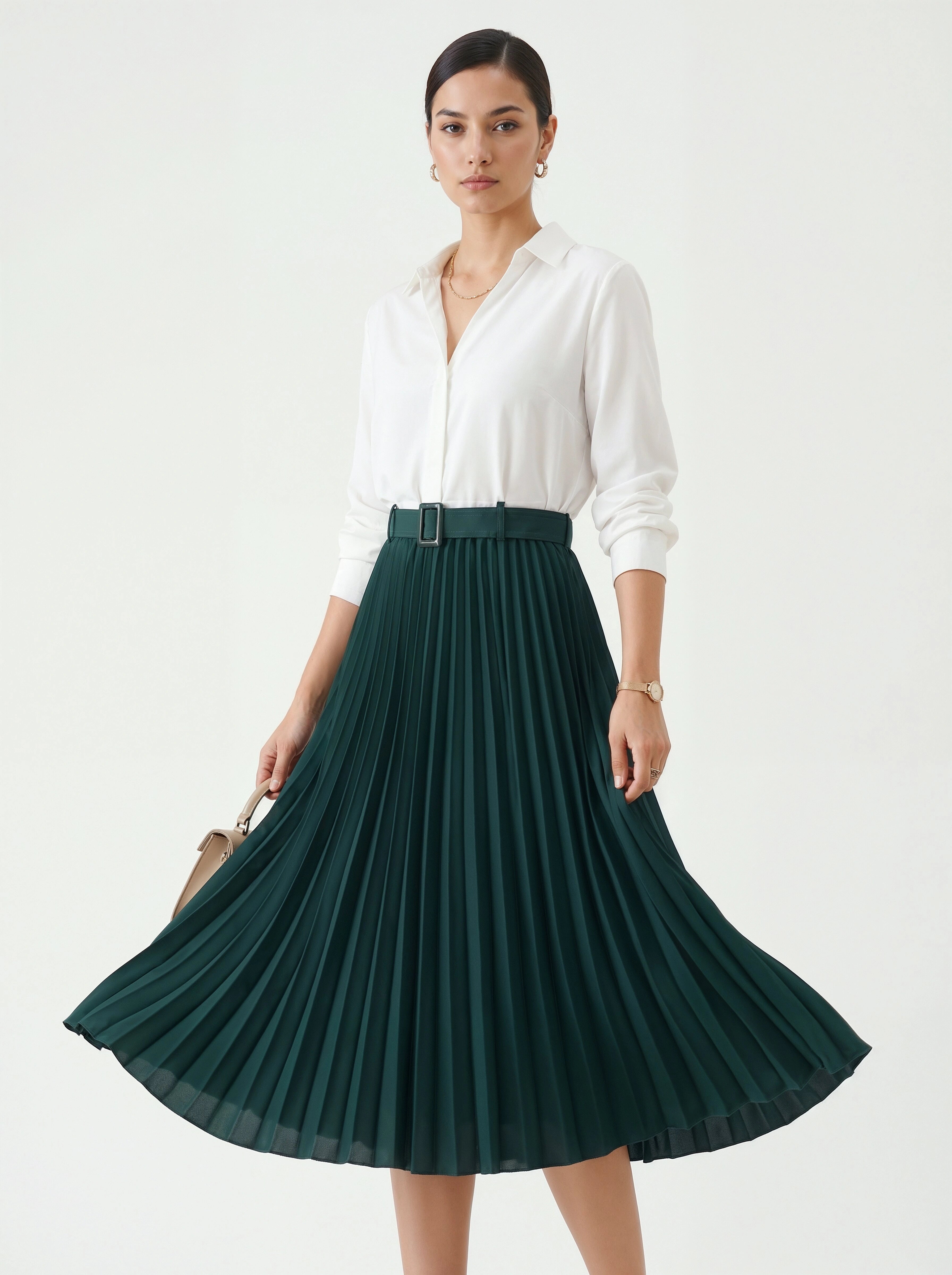 Woman wearing a white blouse and green pleated skirt on a white background