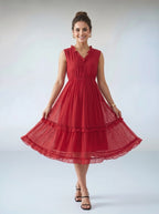 Woman wearing a red dress on a white background
