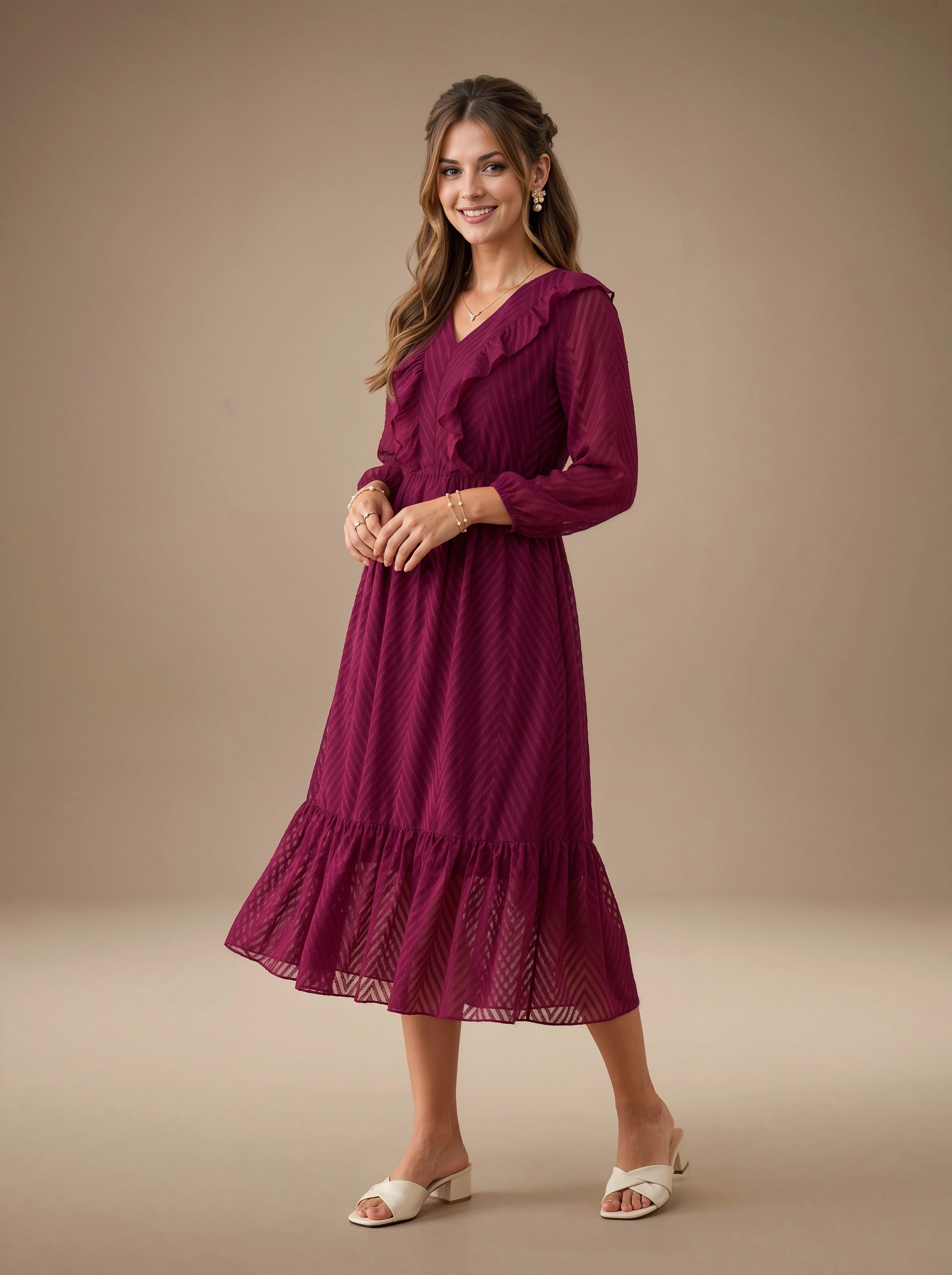 Woman wearing a burgundy dress against a beige background