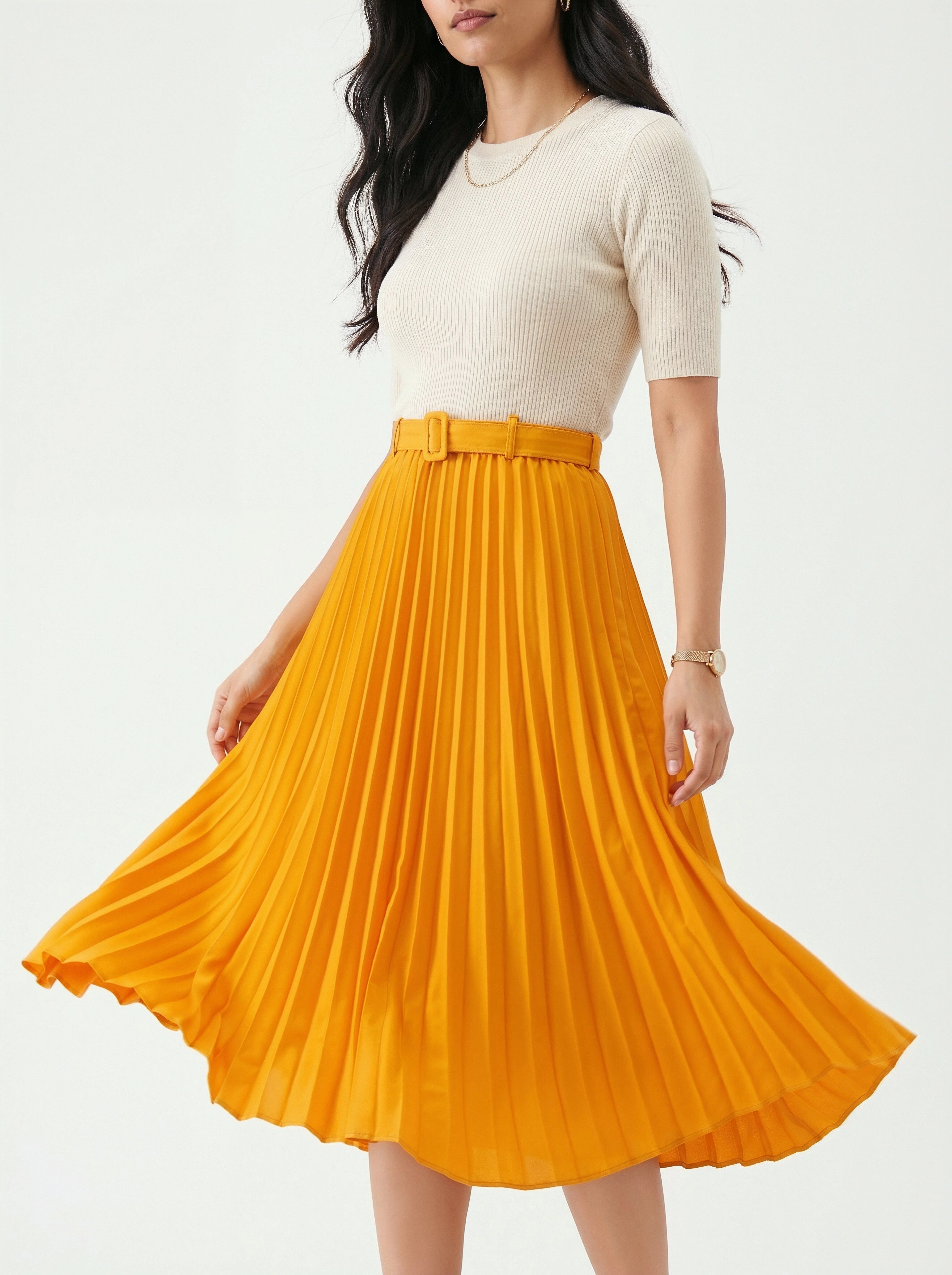 Woman wearing a white top and yellow pleated skirt on a white background