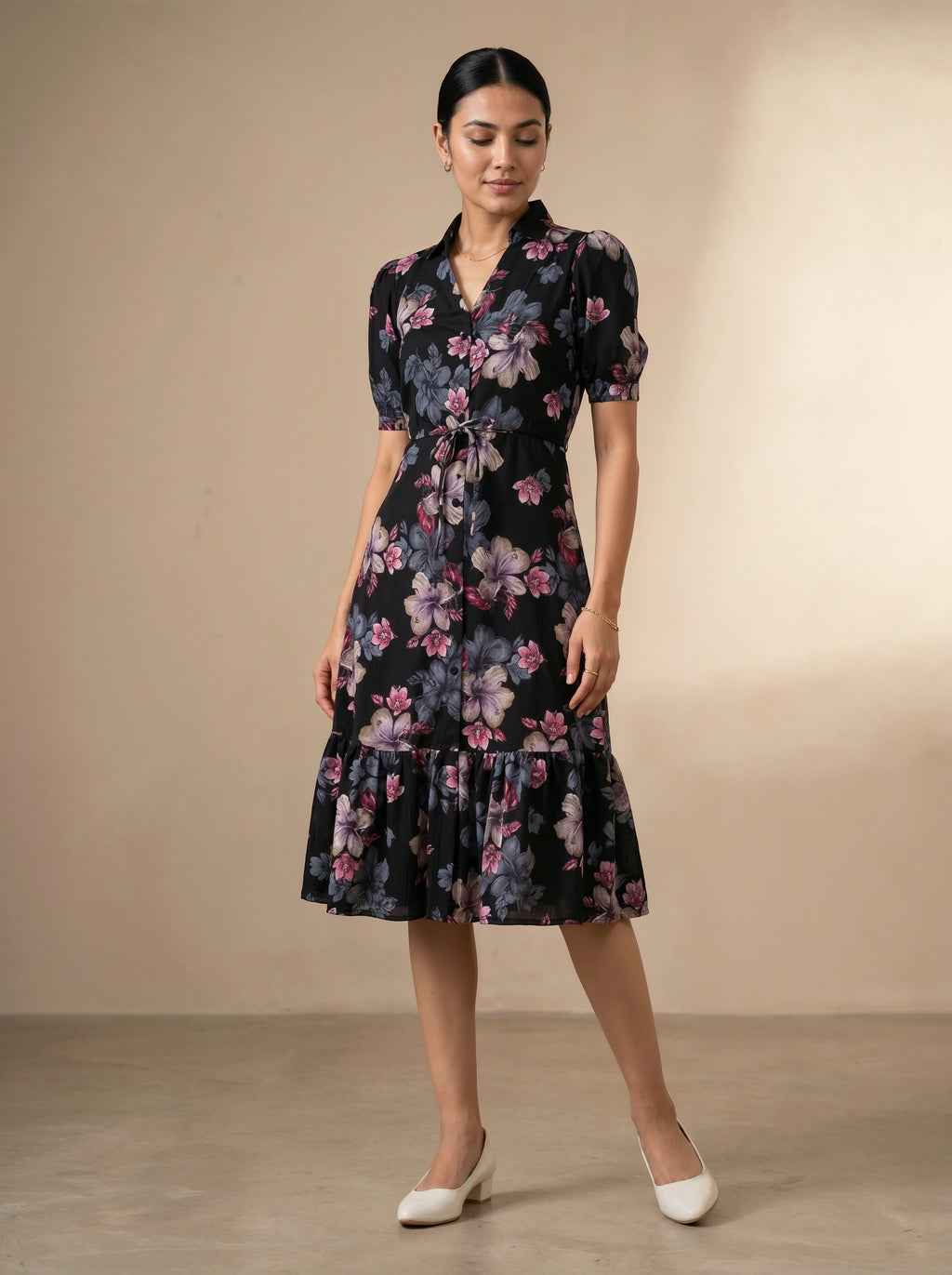 Woman wearing a floral dress against a beige background