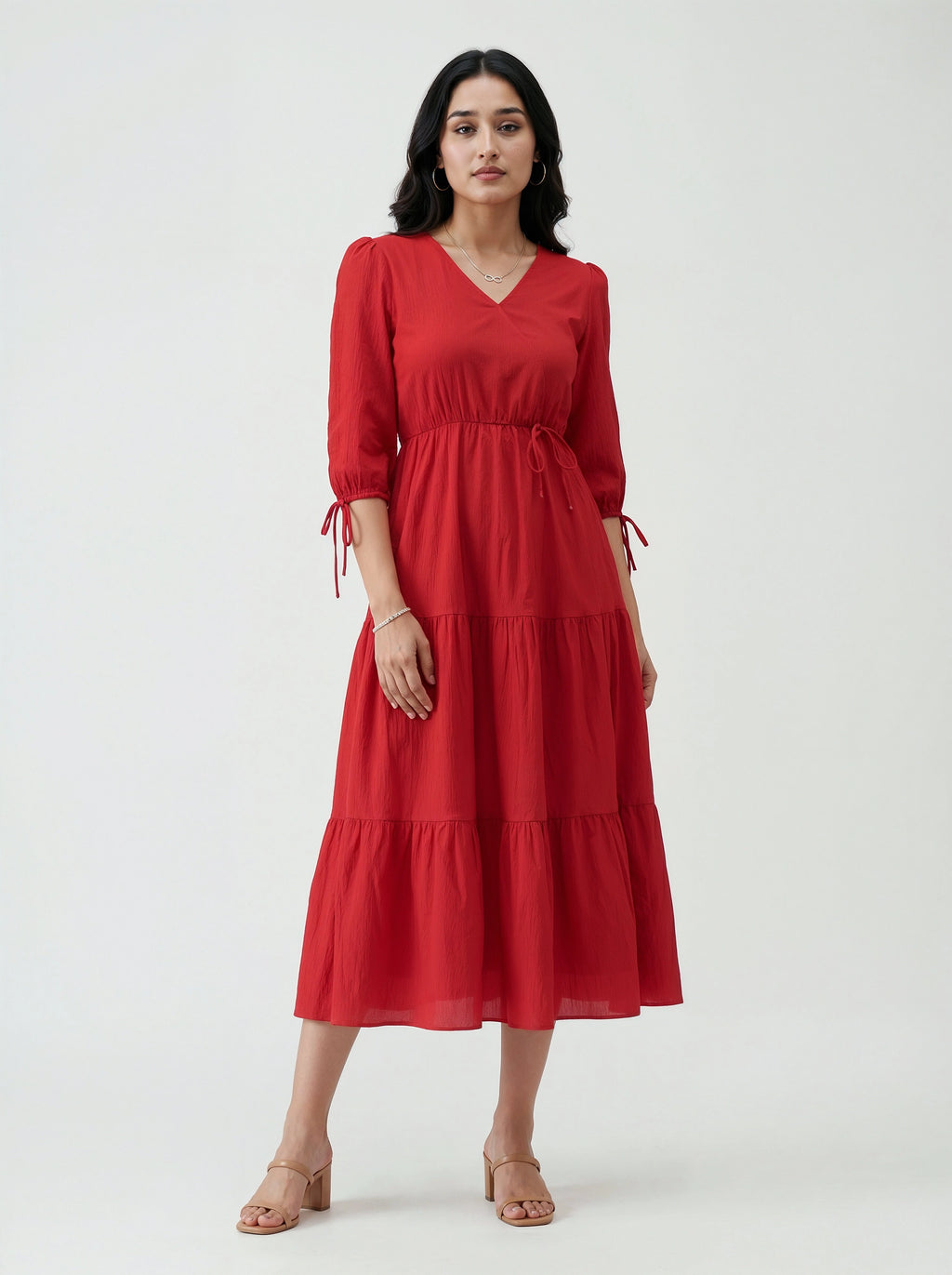 Woman wearing a red dress on a white background