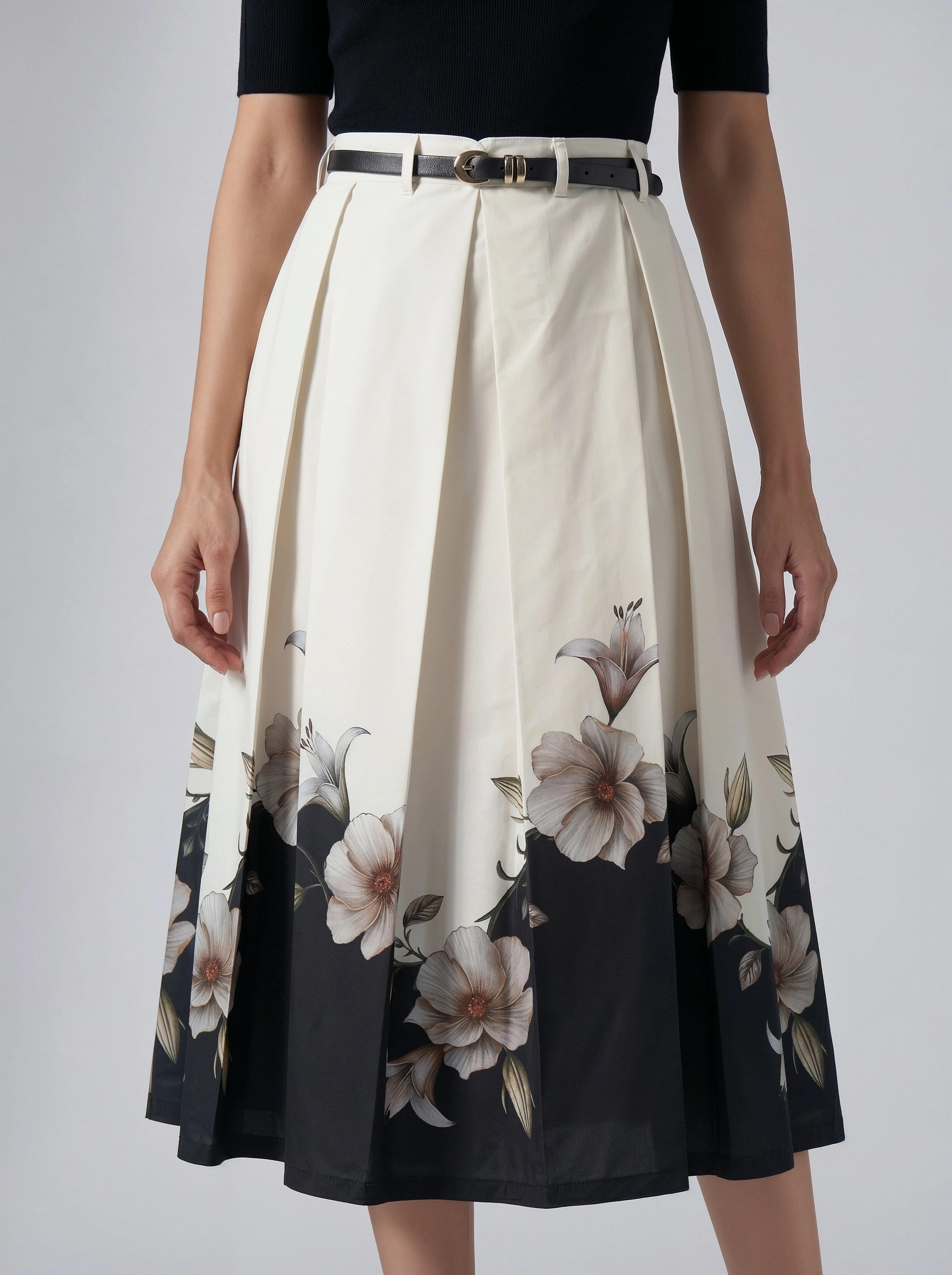 Woman wearing a floral skirt with a plain background