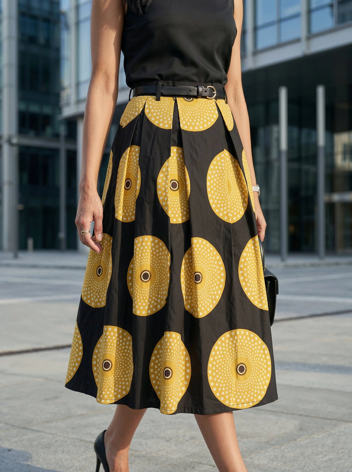 Person wearing a black top and a black and yellow patterned skirt in an urban setting.