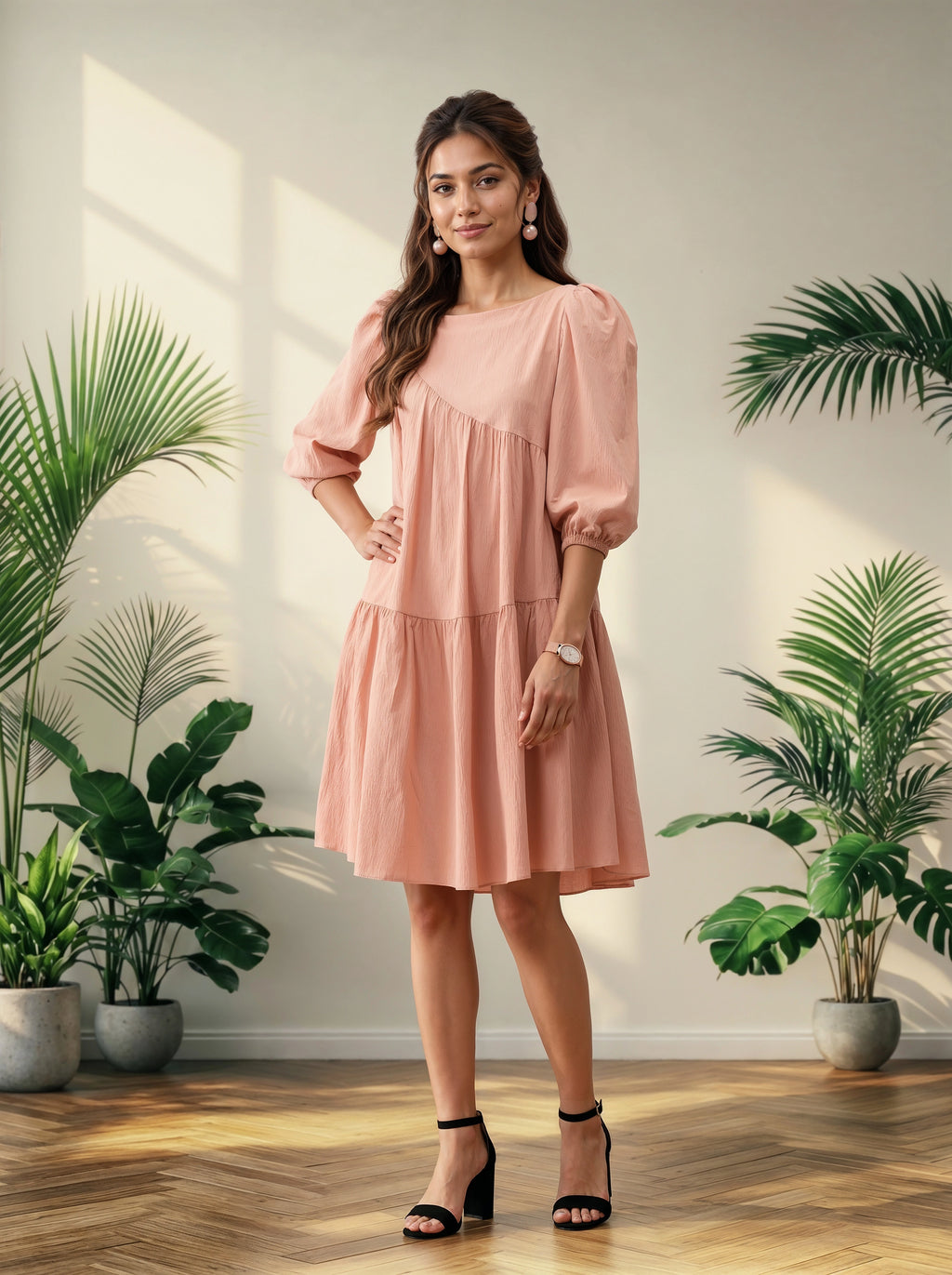 Woman in a pink dress standing in a room with plants