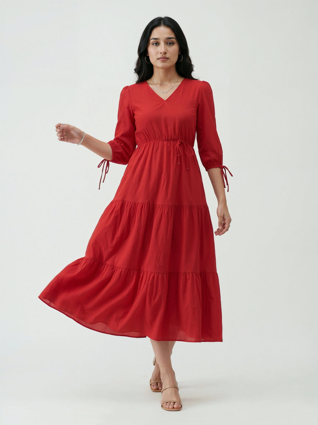 Woman wearing a red dress on a white background