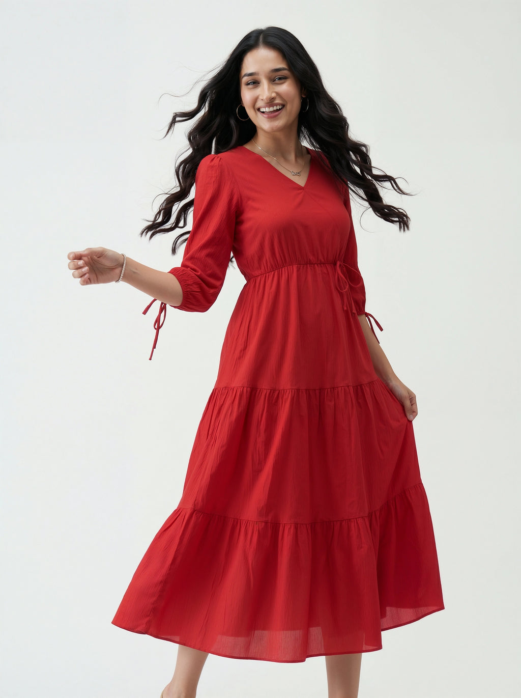 Woman wearing a red dress on a white background