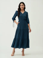 Woman wearing a blue dress on a white background