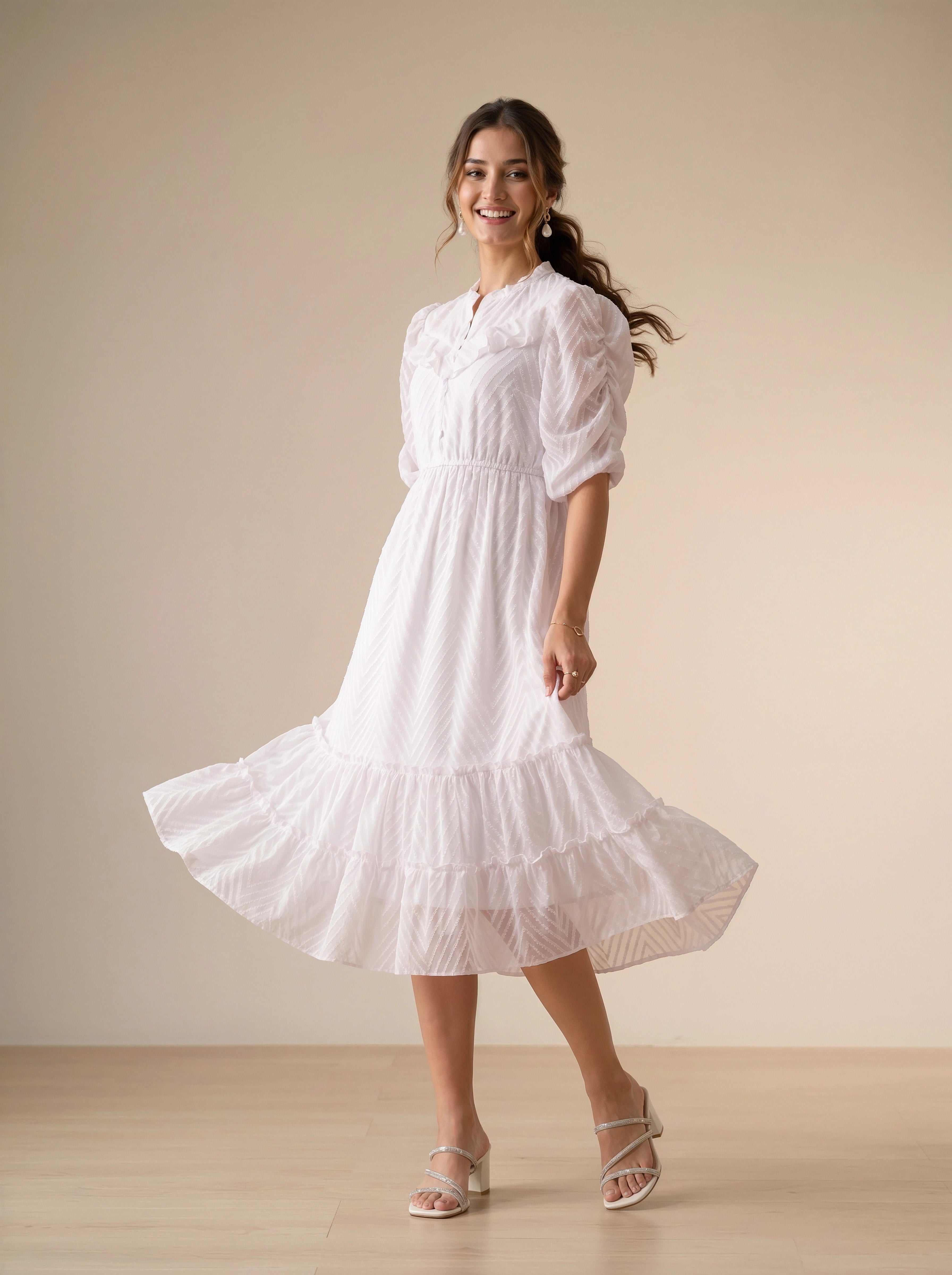 Woman wearing a white dress in a minimalistic setting